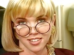 Blonde nerd sticks a dildo up her pussy in the living room